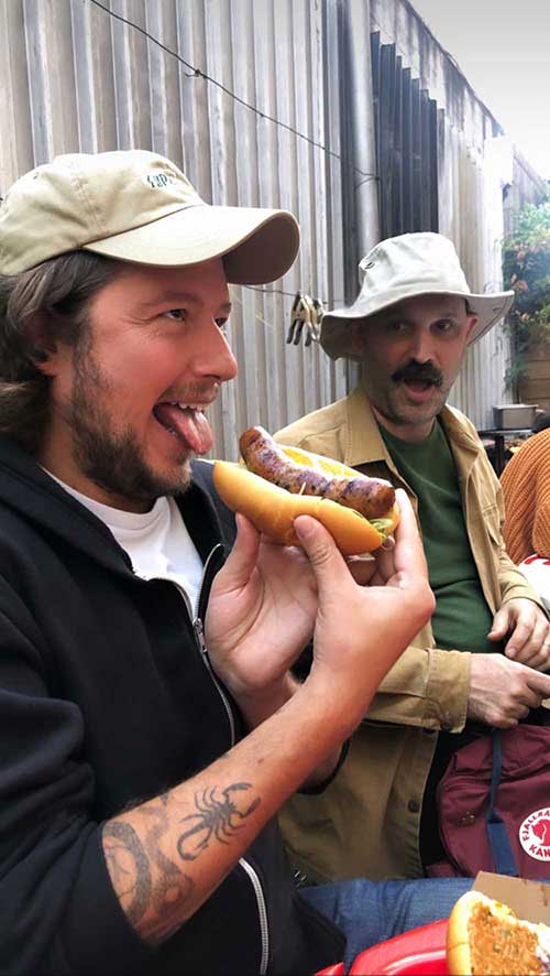 Anthony Falco enjoying a hot dog.