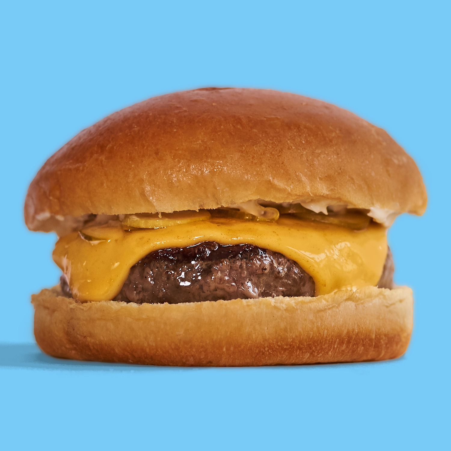 A Richard Eaglespoon burger with a blue background.